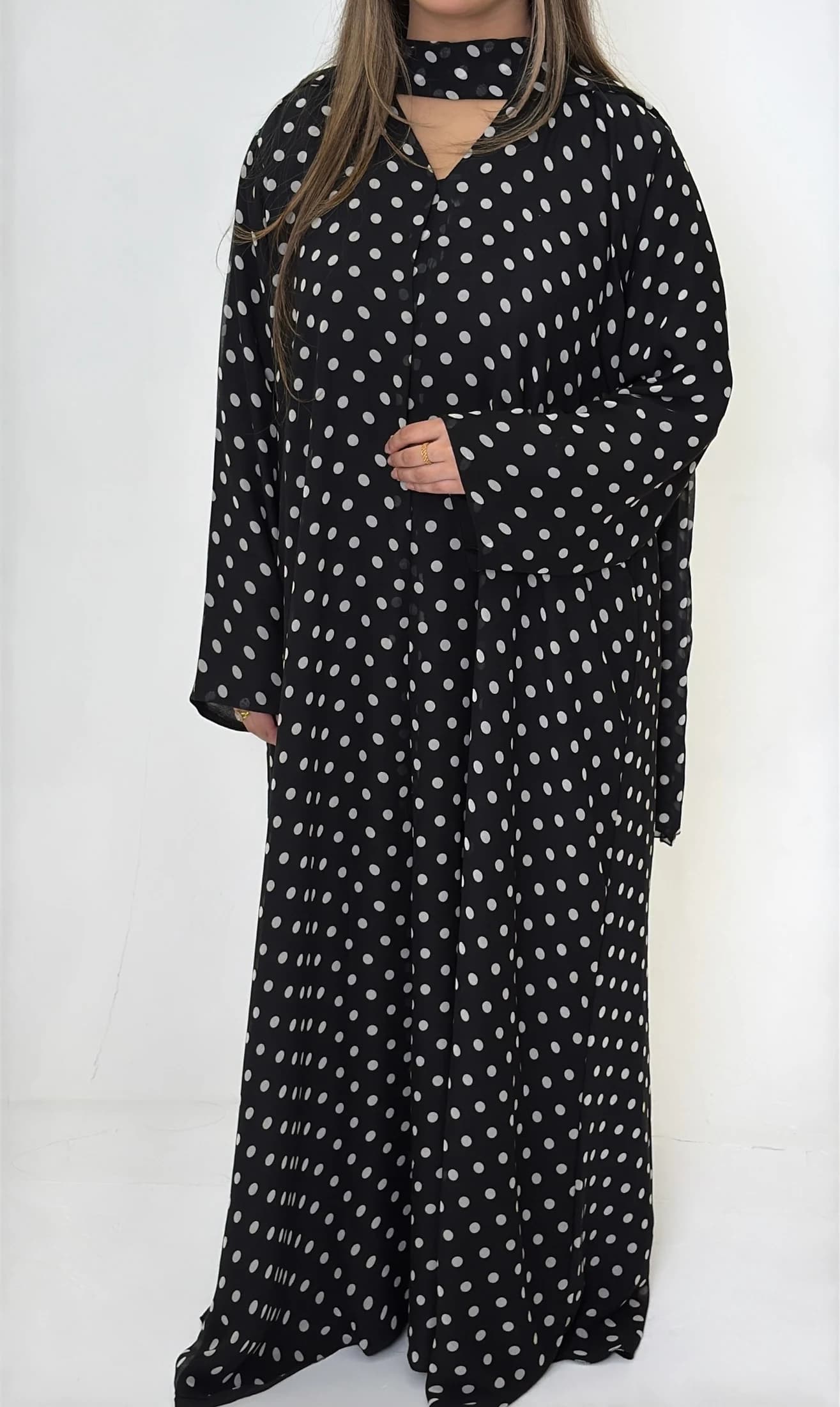 Black abaya and matching scarf with ivory polka dots.